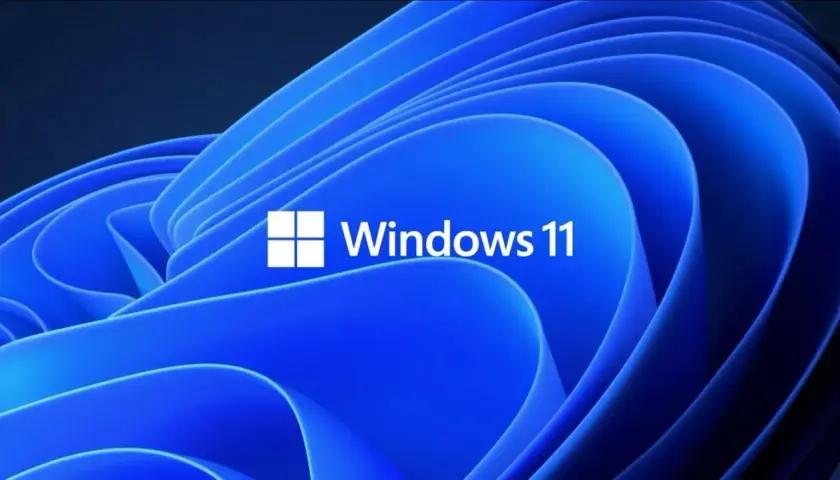 Niebieskie, faliste tło z białym logo i napisem "Windows 11". Ten klucz Windows 11 otwiera drzwi do nowoczesnego systemu.