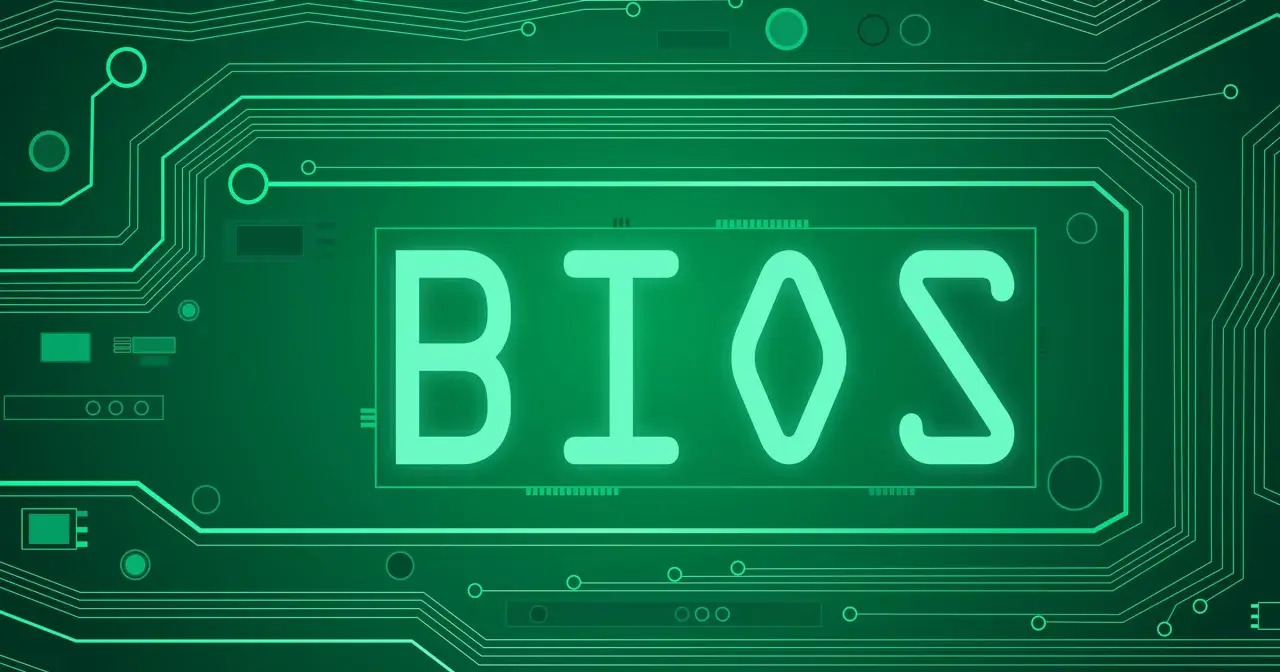 Zielony obwód drukowany z napisem BIOS. Dowiedz się, jak zaktualizować BIOS, aby Twój komputer działał sprawniej.